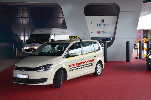 Frankfurter Flughafen mit rotem Farbasphalt CreaPhalt rot Eingang Hilton Hotel
